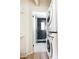 Stacked laundry units adjacent to the newly renovated bathroom at 589 Auburn Ne Ave # F, Atlanta, GA 30312