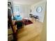 Well-lit living room featuring wood floors, modern decor, a comfortable sofa, and a stylish layout at 589 Auburn Ne Ave # F, Atlanta, GA 30312