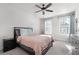 Cozy bedroom with natural light, carpet flooring, and a ceiling fan at 852 Constellation Dr, Decatur, GA 30033