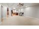 Wide open finished basement space featuring a small bar and multiple seating areas at 3198 Highland Forge Trl, Dacula, GA 30019