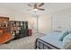 Bedroom with a ceiling fan and neutral carpet with a trundle bed at 3198 Highland Forge Trl, Dacula, GA 30019