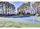 Well-maintained tennis courts with Chapel Hills logo and ample lighting at 3433 Pinemont Dr, Douglasville, GA 30135