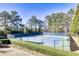 Outdoor tennis courts with Chapel Hills logo and manicured landscaping at 3433 Pinemont Dr, Douglasville, GA 30135