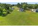 Aerial view of a home featuring an expansive lawn and surrounding greenery at 1300 Snapping Shoals Rd, Mcdonough, GA 30252