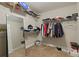 Walk-in closet with carpet and wire shelving for clothing and storage at 1300 Snapping Shoals Rd, Mcdonough, GA 30252