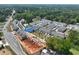 Aerial view of new construction community with pool and green spaces at 3336 Cranston Ln, Kennesaw, GA 30144