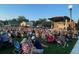 Outdoor amphitheater, full of people, and a stage for outdoor entertainment at 3336 Cranston Ln, Kennesaw, GA 30144