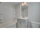 Cozy bathroom with a shower-tub combo and modern vanity with white countertop at 3336 Cranston Ln, Kennesaw, GA 30144