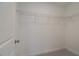 Walk-in closet with metal shelving for organized storage at 3336 Cranston Ln, Kennesaw, GA 30144