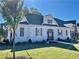 Well-maintained, one-story home with white siding, gray shutters and new landscaping at 3336 Cranston Ln, Kennesaw, GA 30144