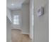 Entryway with hardwood floors and view of staircase, front door and bathroom doorway at 3336 Cranston Ln, Kennesaw, GA 30144