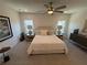 Spacious bedroom with a ceiling fan, neutral colors, and natural light at 3987 Allegretto Cir # 250, Atlanta, GA 30339