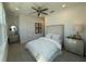 This bedroom features recessed lighting, a ceiling fan, two side tables, and coordinated decor at 3987 Allegretto Cir # 250, Atlanta, GA 30339