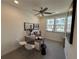 Comfortable home office featuring neutral walls, carpet, and great natural lighting at 3987 Allegretto Cir # 250, Atlanta, GA 30339