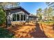 Beautifully landscaped backyard with a deck and mature trees, perfect for outdoor living at 727 Cool Hollow Dr, Decatur, GA 30033