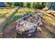 Beautifully landscaped rock garden showcasing vibrant flowers and lush greenery near a deck at 727 Cool Hollow Dr, Decatur, GA 30033