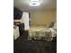 Cozy bedroom with a comfortable bed and convenient access to the adjoining room at 123 Spring St, Stockbridge, GA 30281