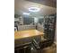 Bright kitchen featuring an island with breakfast bar seating and modern appliances at 123 Spring St, Stockbridge, GA 30281