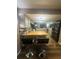 Bright kitchen featuring an island with breakfast bar seating and modern appliances at 123 Spring St, Stockbridge, GA 30281
