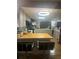 Bright kitchen featuring an island with breakfast bar seating and modern appliances at 123 Spring St, Stockbridge, GA 30281