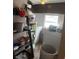 This laundry area features a stacked washer/dryer and additional storage space at 123 Spring St, Stockbridge, GA 30281