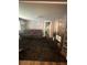 Comfortable living room with plush seating and entertainment center at 123 Spring St, Stockbridge, GA 30281