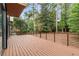 Spacious back deck with modern railing overlooks the lush backyard at 1653 Wayland Ne Cir, Brookhaven, GA 30319