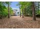 Expansive backyard with modern home and large deck visible at 1653 Wayland Ne Cir, Brookhaven, GA 30319