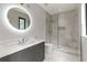 Modern bathroom with marble countertops, sleek vanity, and glass-enclosed shower at 1653 Wayland Ne Cir, Brookhaven, GA 30319