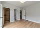 Bedroom with an open closet and doors leading to other rooms in the home at 1653 Wayland Ne Cir, Brookhaven, GA 30319