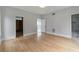 Spacious bedroom featuring hardwood floors, ensuite bathroom, and custom closet at 1653 Wayland Ne Cir, Brookhaven, GA 30319