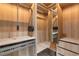 Custom walk-in closet with built-in shelving, drawers, and ample storage space at 1653 Wayland Ne Cir, Brookhaven, GA 30319