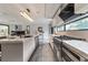 Gourmet kitchen with marble countertops, stainless steel appliances, and a sleek, modern design at 1653 Wayland Ne Cir, Brookhaven, GA 30319