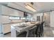 Gourmet kitchen with a spacious island, modern appliances, and a sleek design perfect for entertaining guests at 1653 Wayland Ne Cir, Brookhaven, GA 30319