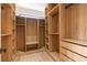 Custom walk-in closet with built-in shelving and drawer storage at 1653 Wayland Ne Cir, Brookhaven, GA 30319