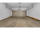 Clean garage with an automatic door, ready for vehicles and storage at 3624 Silvery Way, Powder Springs, GA 30127