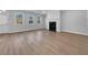 Spacious living room featuring a fireplace and luxury vinyl plank flooring at 3624 Silvery Way, Powder Springs, GA 30127
