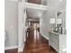 Bright foyer with hardwood floors, high ceilings, and a view into the living spaces at 5365 Vendelay Ln, Cumming, GA 30040