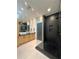 Modern bathroom featuring double sinks, a sleek glass shower, and contemporary design at 1323 Peachtree Ne Vw, Atlanta, GA 30319