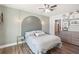 Charming bedroom with modern decor, a ceiling fan, and wood-look flooring at 1521 Dianne Se Ct, Atlanta, GA 30316