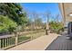 Large wooden deck offering ample space and a view of the backyard at 1521 Dianne Se Ct, Atlanta, GA 30316