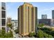 High-rise condominium featuring city views and a brick exterior at 300 Peachtree St # 23-A, Atlanta, GA 30308