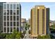 Modern building in a walkable neighborhood featuring city views and trees at 300 Peachtree St # 23-A, Atlanta, GA 30308