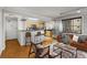 Inviting living room open to kitchen featuring bar seating and modern decor at 300 Peachtree St # 23-A, Atlanta, GA 30308