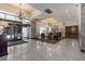 Elegant building lobby featuring chandeliers, marble floors, and comfortable seating areas at 300 Peachtree St # 23-A, Atlanta, GA 30308