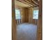 Unfinished bedroom with stud framing and natural light at 5393 Booker T Dr, Morrow, GA 30260