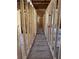 Unfinished hallway shows the framing and layout of this home at 5393 Booker T Dr, Morrow, GA 30260