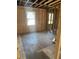 Spacious living room with original wood floors, awaiting personalized finishing touches at 5393 Booker T Dr, Morrow, GA 30260