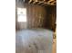 Partially renovated living room with hardwood floors and natural light beaming through at 5393 Booker T Dr, Morrow, GA 30260