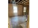 Spacious living room with original wood floors, awaiting personalized finishing touches at 5393 Booker T Dr, Morrow, GA 30260